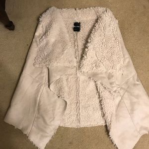 Faux fur and suede cream vest